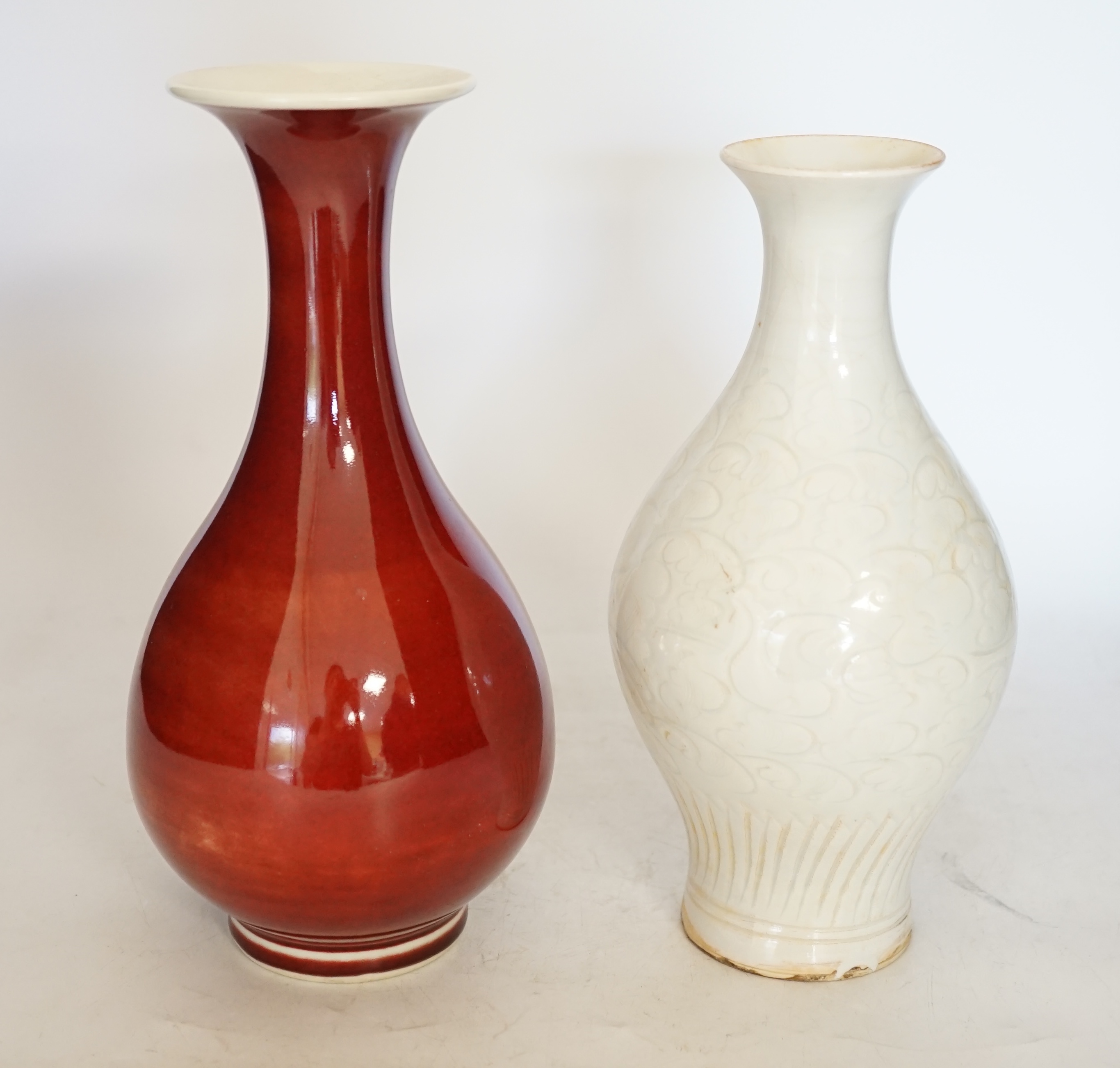 Two Chinese vases including a sang de boeuf example, largest 25cm high. Condition - larger example good, other with crazing